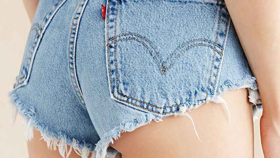 denim shorts with pockets hanging out
