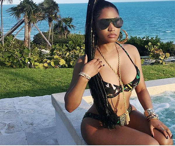 Nicki Minaj Slays In Versace Swimsuit By The Pool Side