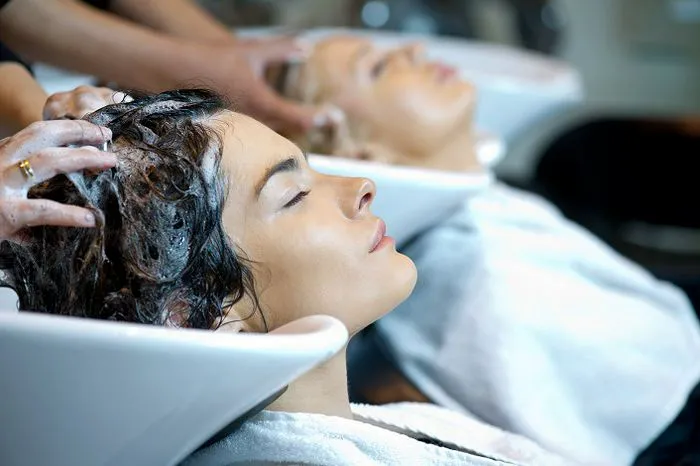 Not clarifying your hair before you step foot into a salon.
