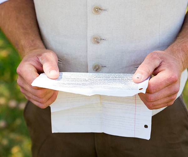 man holding wedding vows