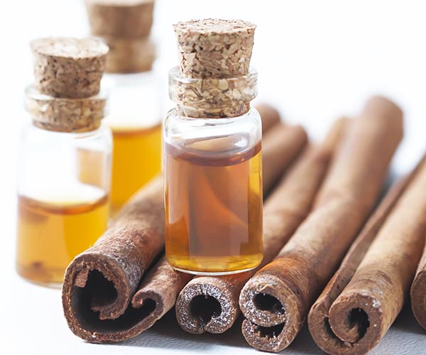 Harnessing Cinnamon Essential Oil for a Flat Abdomen at 40 and Beyond