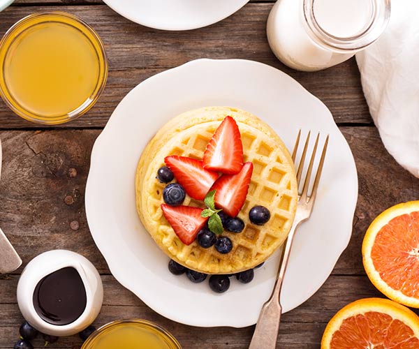 waffles and berries on a plate