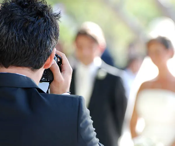 Photographer with couple