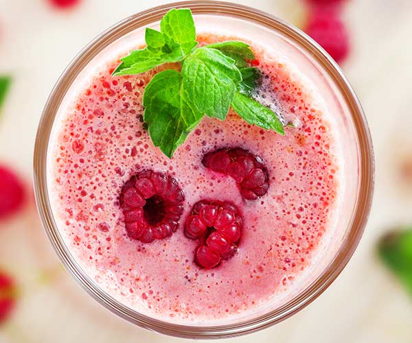 pink smoothie with raspberries