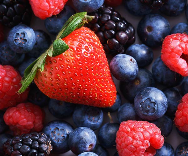 assorted strawberries, blueberries and blackberries