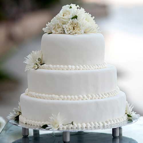 3-tier wedding cake with white frosting