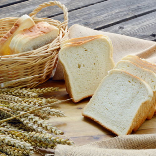 white bread basket on a table