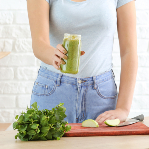 woman with green smoothie