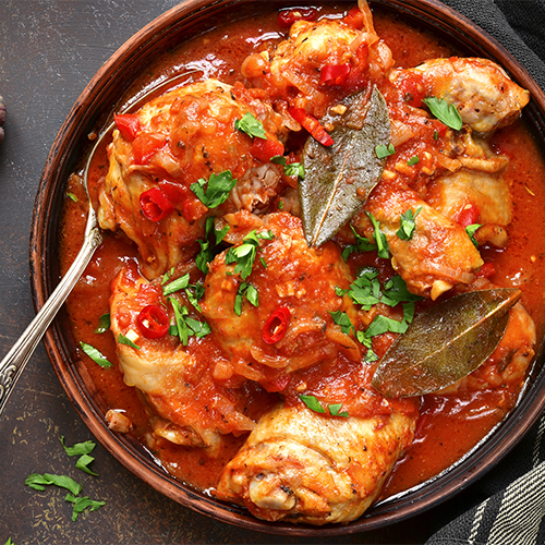 Chicken cacciatore in a bowl.