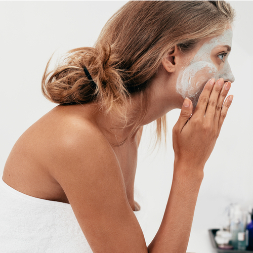 woman washing face