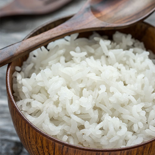 Cooked white rice in a bowl.