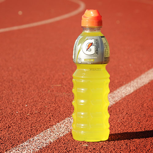 A bottle of Gaterade on a track.