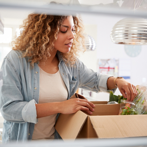 woman unpacking groceries