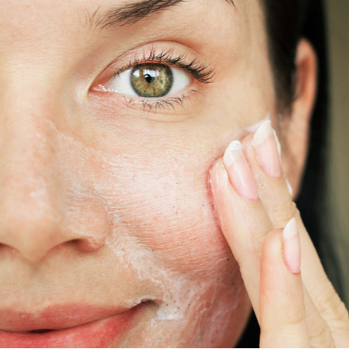 woman washing face