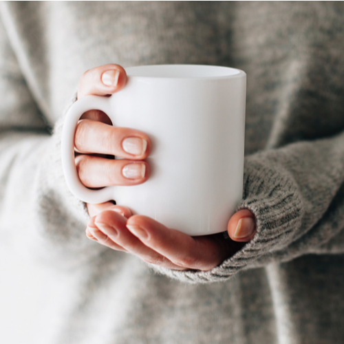 woman holding mug