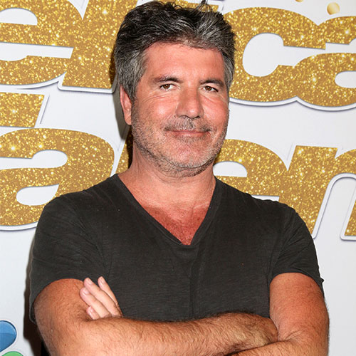 simon cowell bike crash back surgery health status