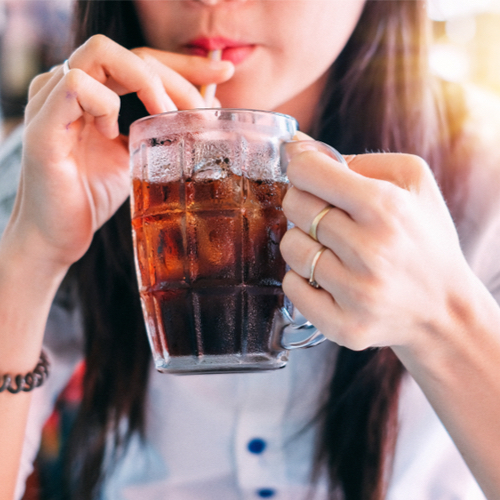 woman drinking soda