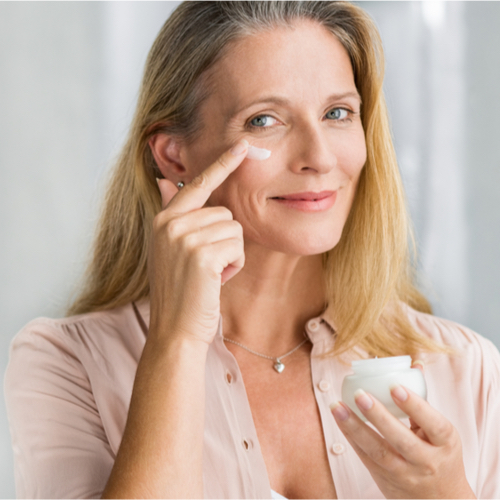 woman applying cream