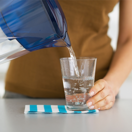 woman pouring water