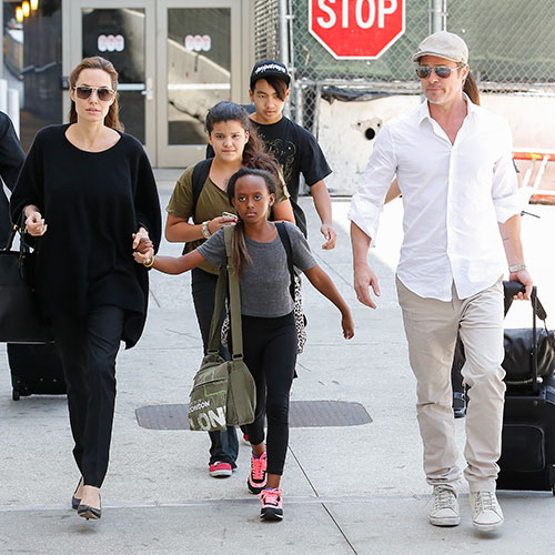 Angelina Jolie's Skinny Waxed, Non-Mom Jeans Are Perfect for Travel (and  Extra Pics of Brad and the Kids Too!)