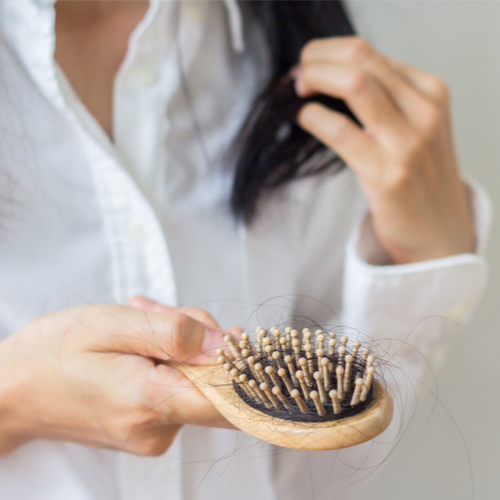 woman brushing hair