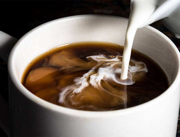 Creamer poured into a coffee