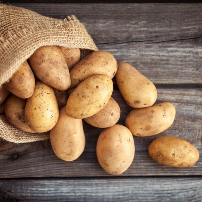 potatoes spilling out of sack