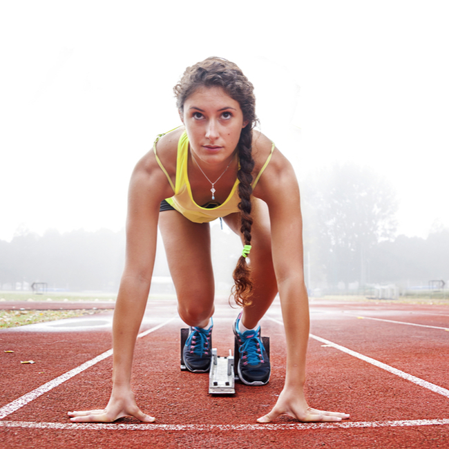 woman preparing to sprint