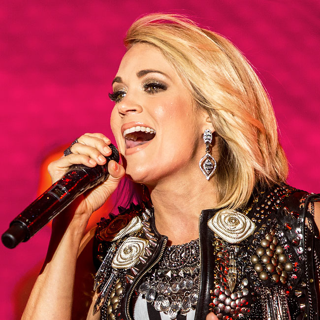 Carrie Underwood Stuns In Tiny Guns N' Roses Romper with Axl Rose, 'Still  Freaking Out