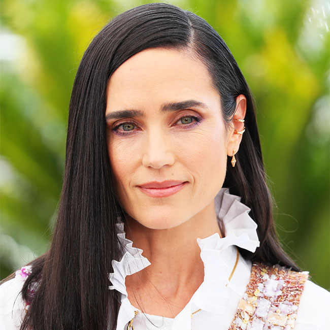 Jennifer Connelly with her hair pulled back into a ponytail and