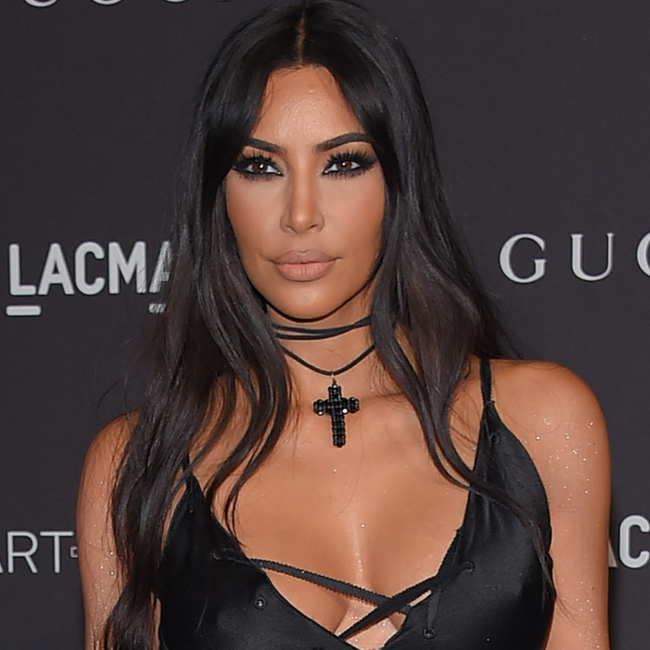 So Hot! Kim Kardashian Flaunts Curves In Skintight Bodysuit