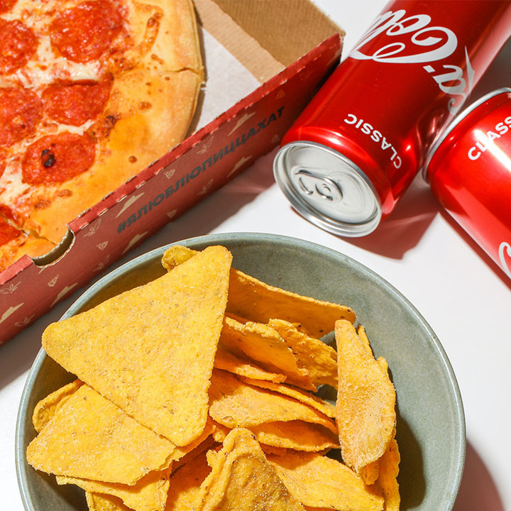 https://www.shefinds.com/files/2022/08/junk-food-pizza-cola-chips.jpg