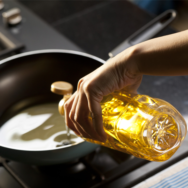 https://www.shefinds.com/files/2022/08/pouring-lot-of-oil-in-pan.jpg