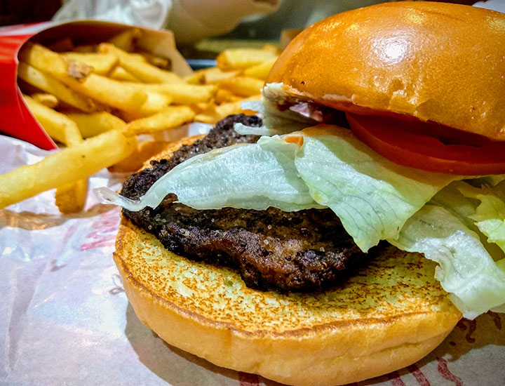 wendy's burger with lettuce and fries