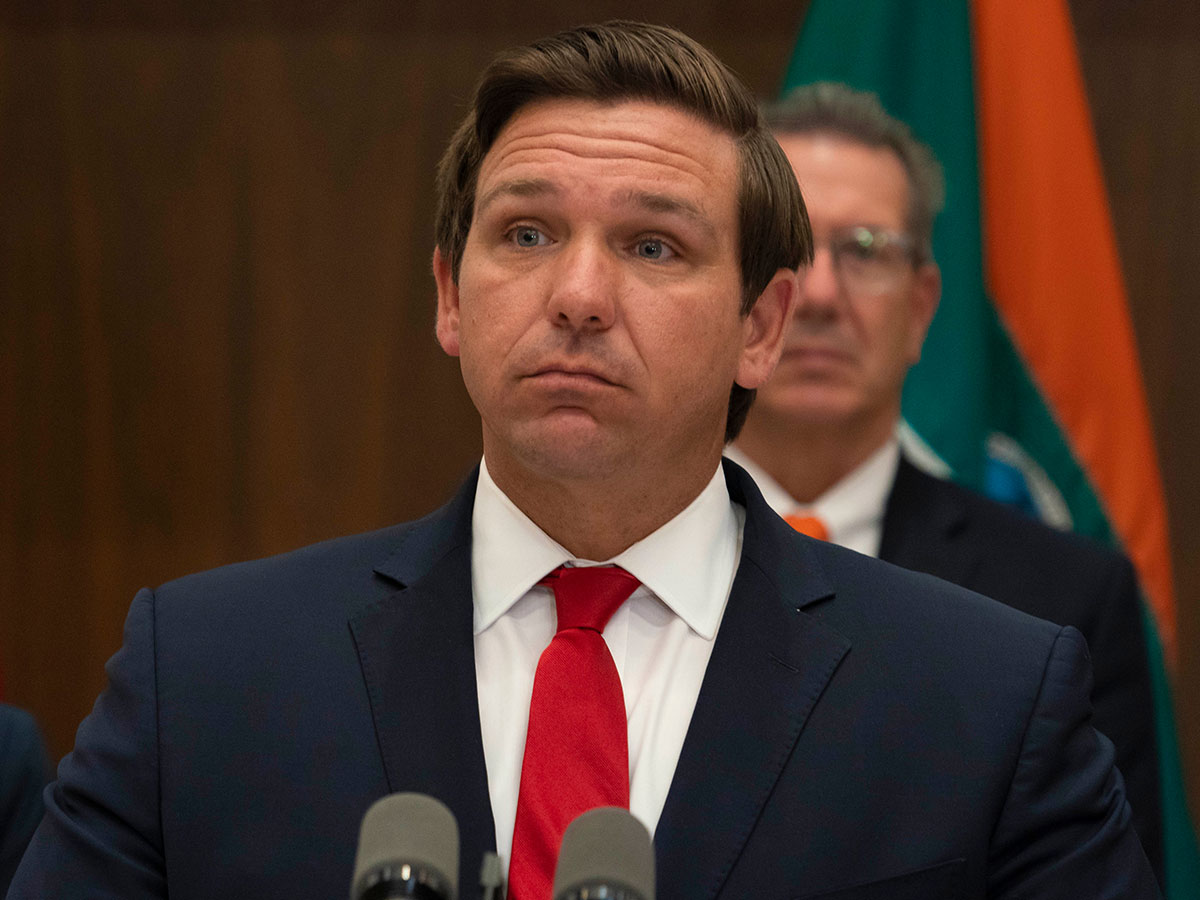 ron desantis speaking red tie