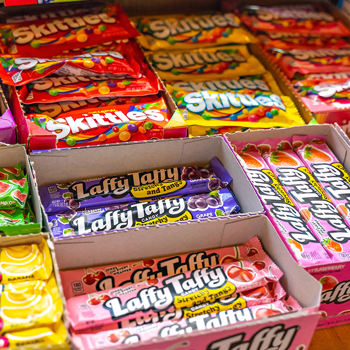 display of skittles and laffy taffy at store