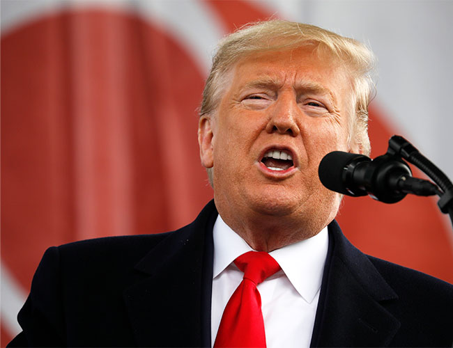 donald trump speaking microphone red tie