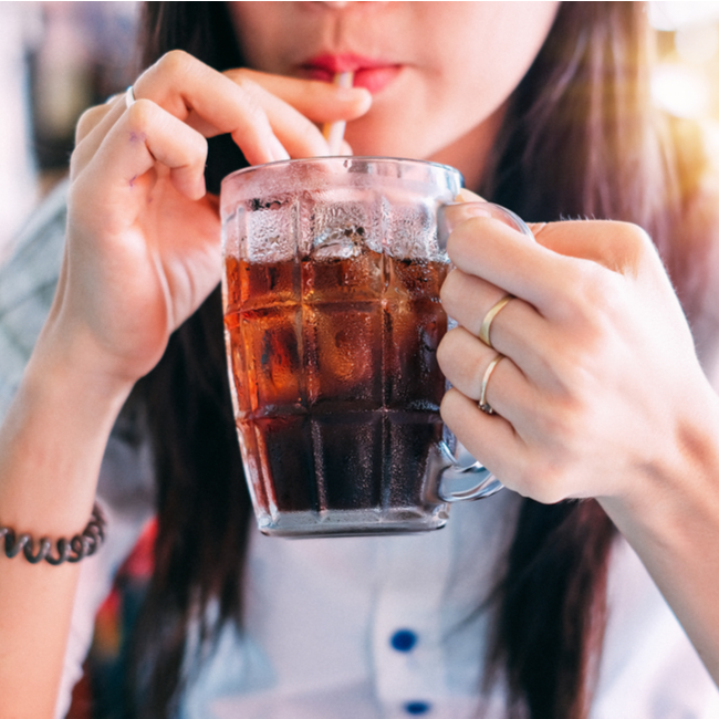 woman drinking soda