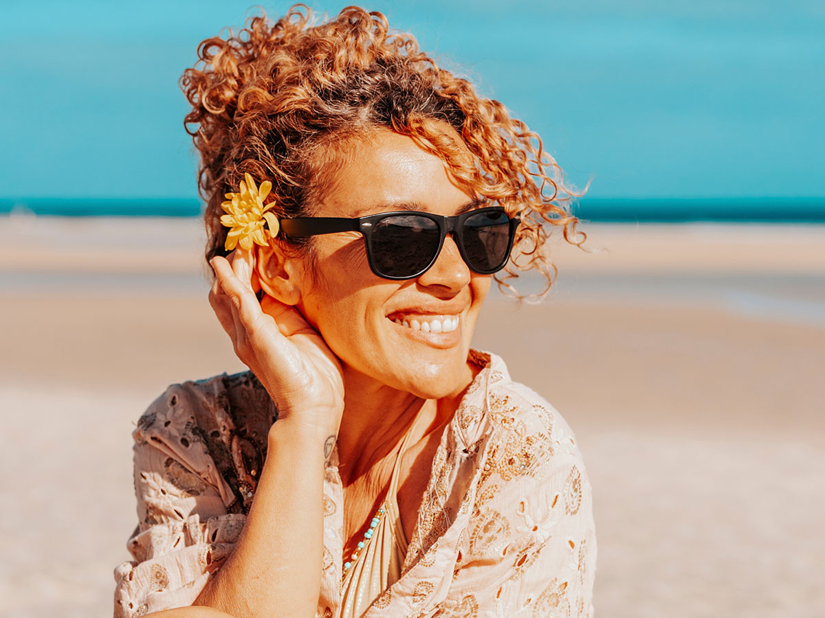 woman-enjoying-beach