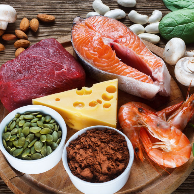 display of seeds, cheese, beef, fish, and veggies