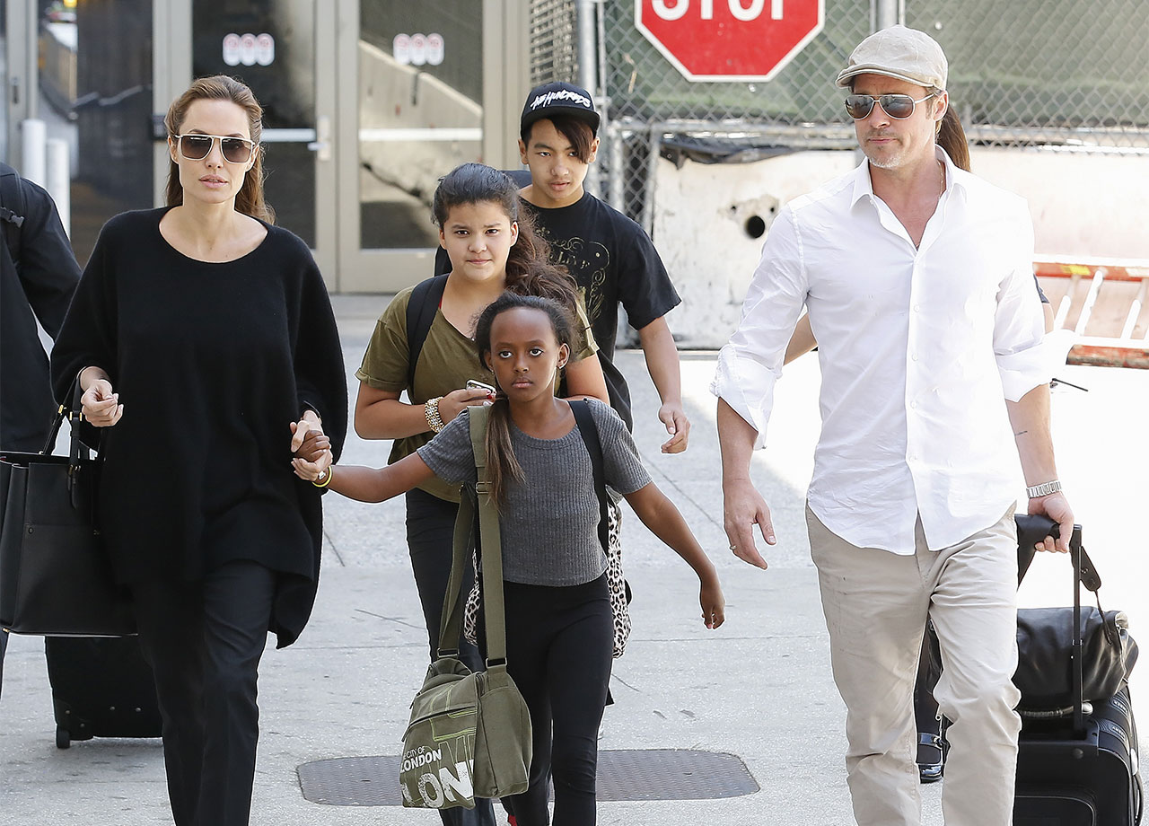 Angelina Jolie Brad Pitt walking with kids