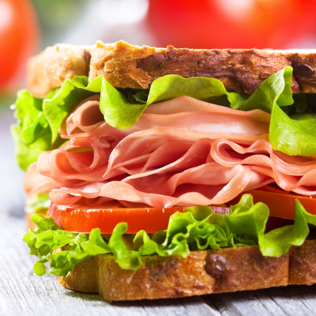 ham sandwich with lettuce and tomato