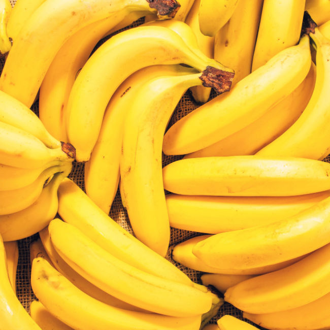 close-up of bunches of yellow bananas