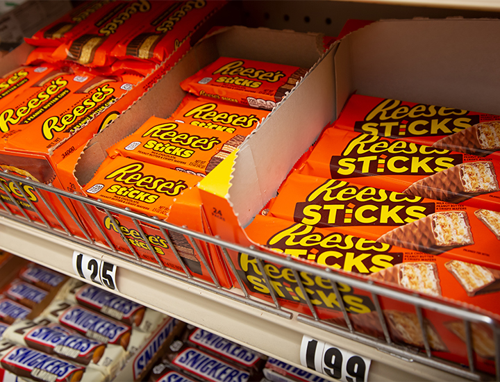 Chocolate candy bars in a shelf