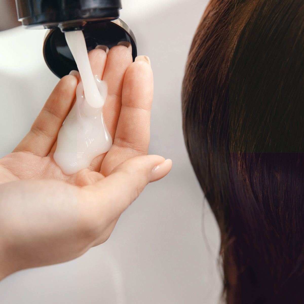 hairdresser squeezing shampoo into hand about to apply to client