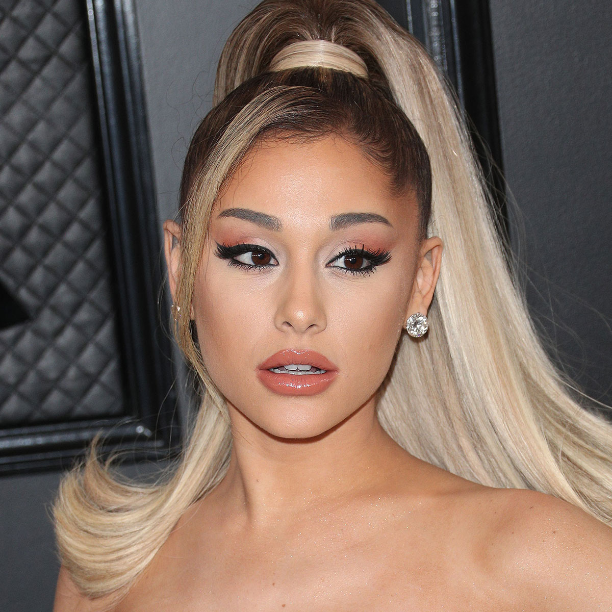 Ariana Grande Glitters in a Minidress, Sheer Tights & 6-Inch Heels –  Footwear News