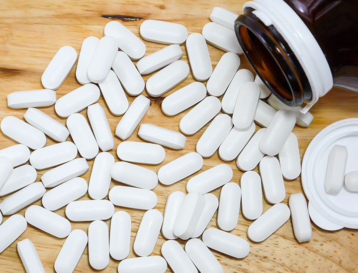 Calcium tablets on a table.