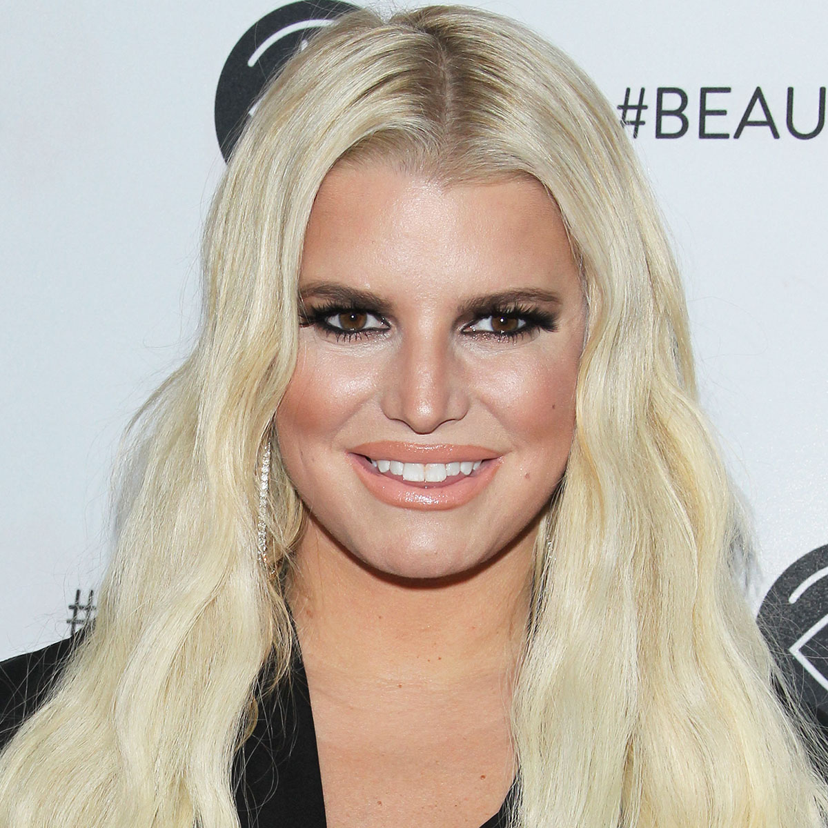 Jessica Simpson Stuns In Tank Top & Jeans After 100 lb. Weight