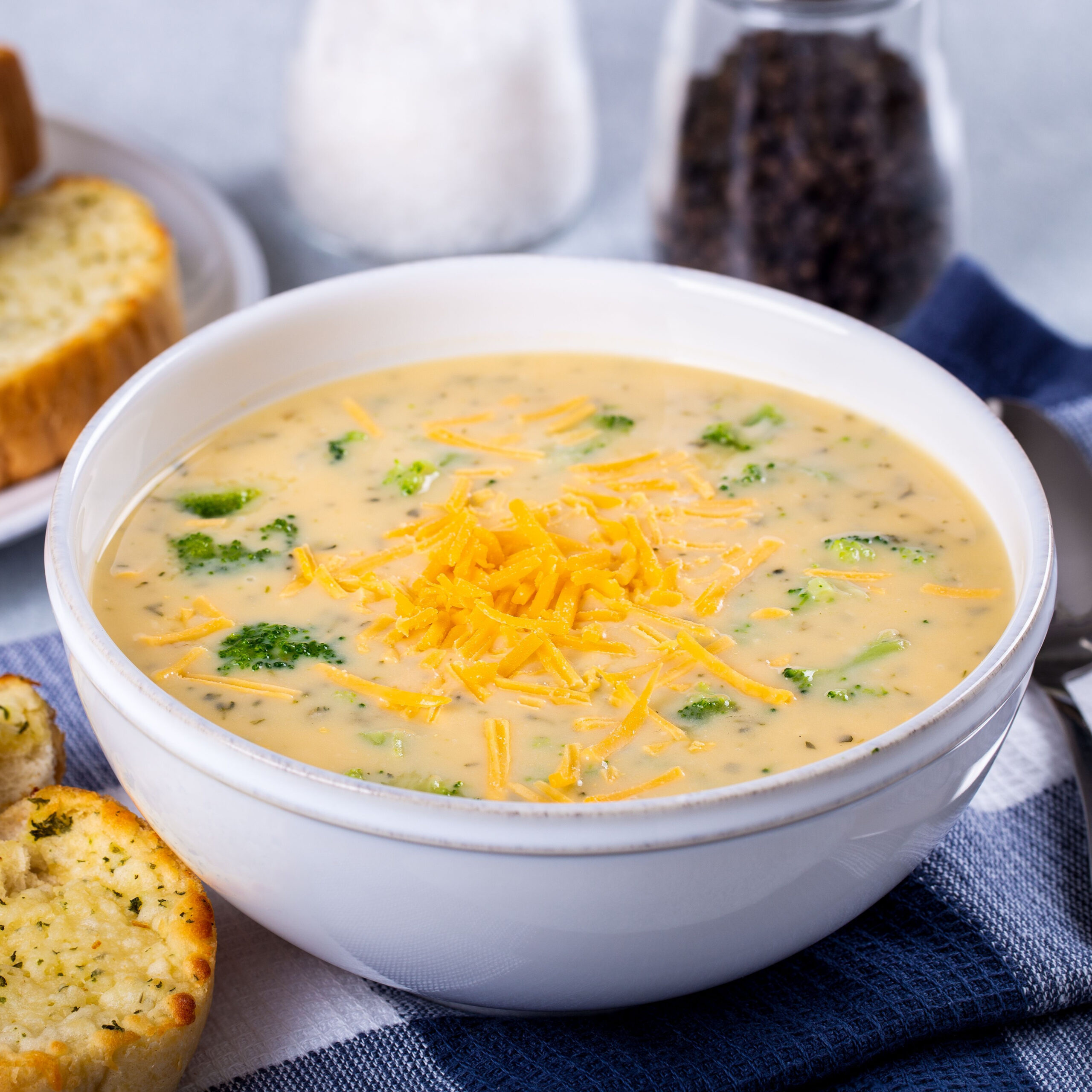 broccoli cheddar soup with side of cheesy garlic bread