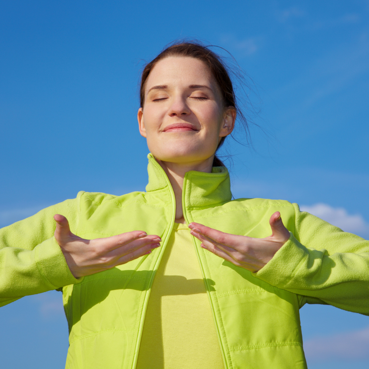 Person doing breathing exercises.